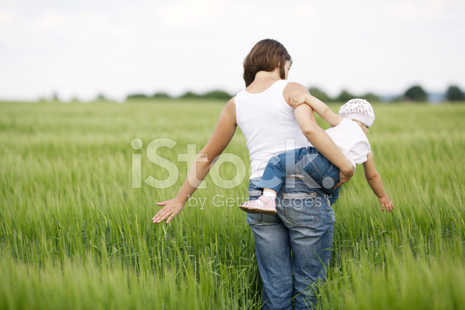 26829482 mother and daughter in field